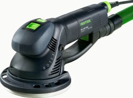 A Festool Rotex RO 150 FEQ power sander with a green and black design, attached to a vacuum hose.